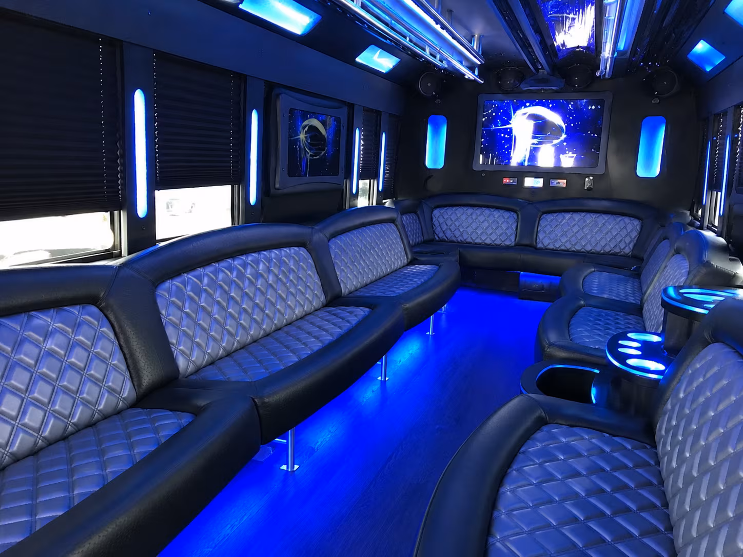 Wedding guests seated inside a party bus serving Santa Ana